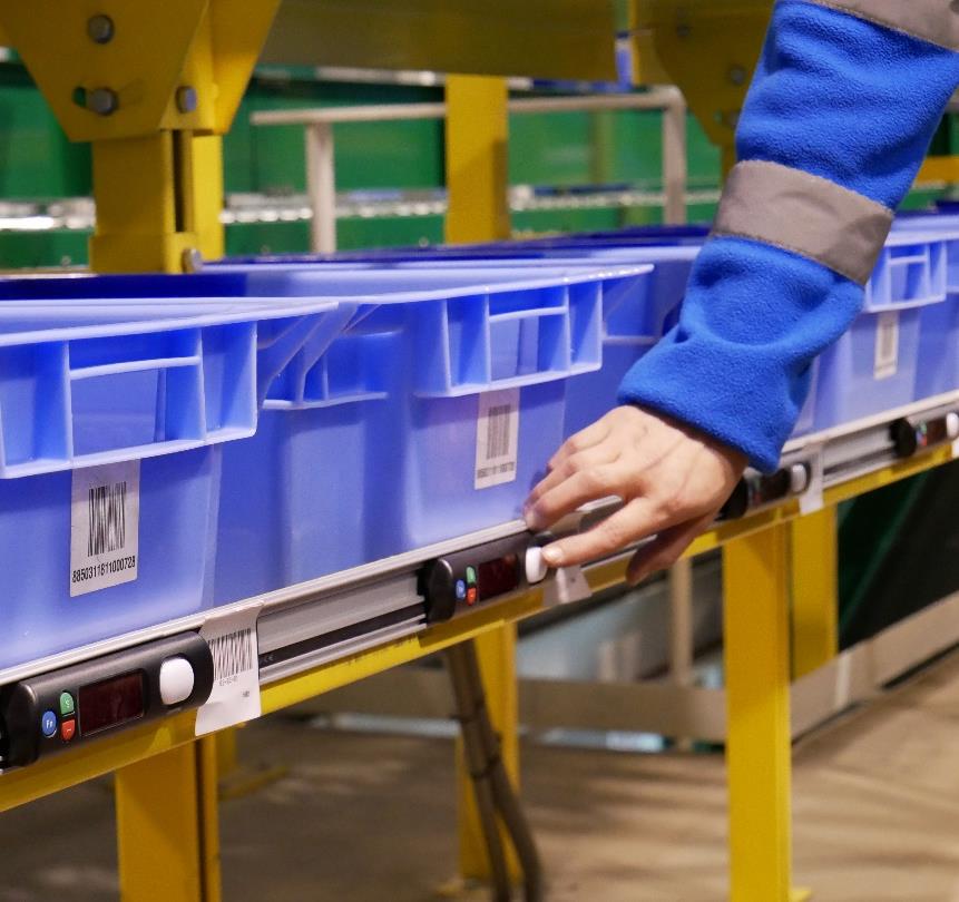 Put to Light system in the warehouse - close-up of control panel and cuvettes - operation